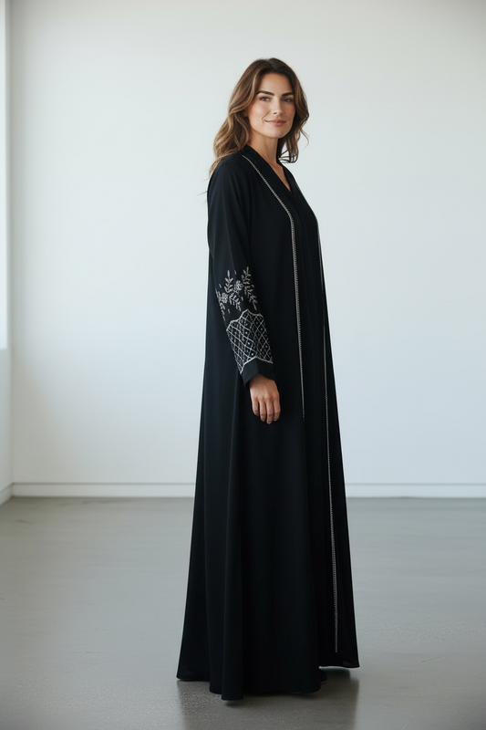 Elegant black modest abaya with geometric stone work on sleeves side view