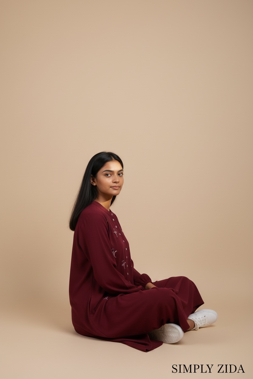 Front view of burgundy embroidered modest midi dress