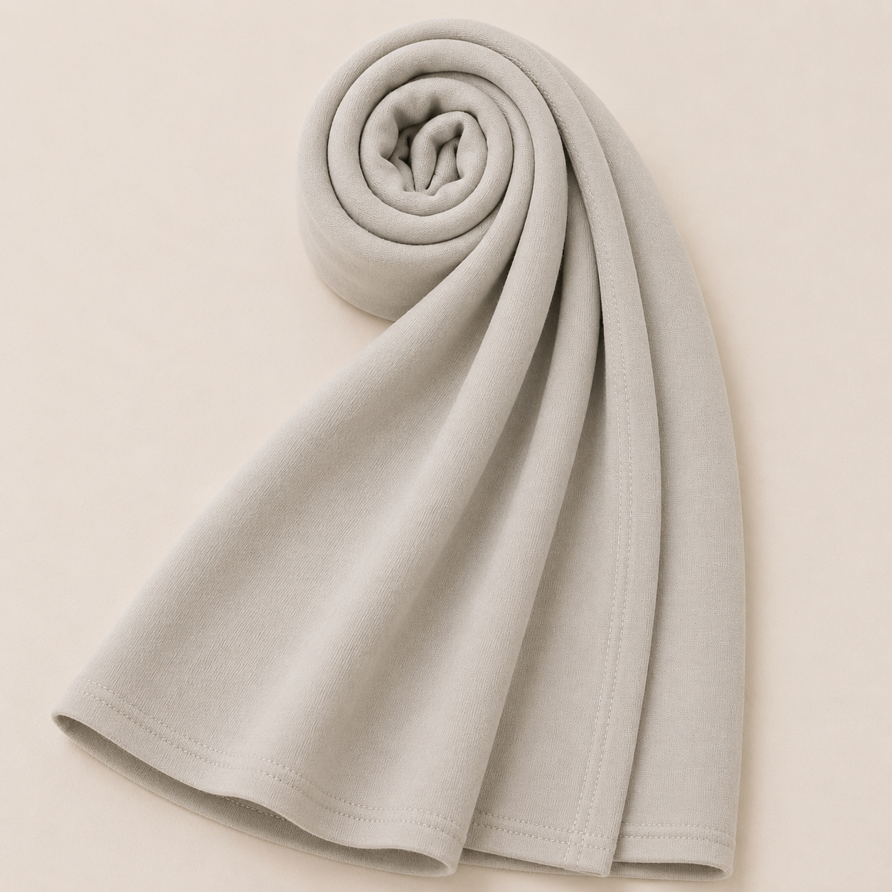 Premium oat beige jersey hijab with soft stretch fabric and stitched edge detailing by Simply Zida