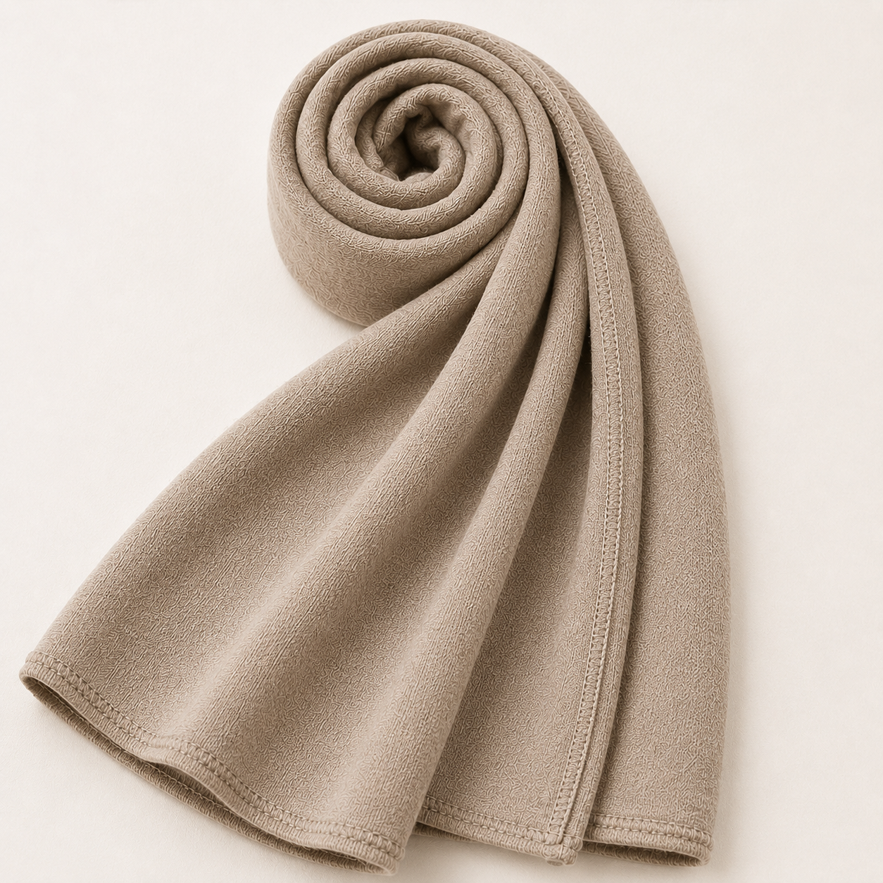 Premium warm stone jersey hijab with soft stretch fabric and elegant stitched edge detailing by Simply Zida