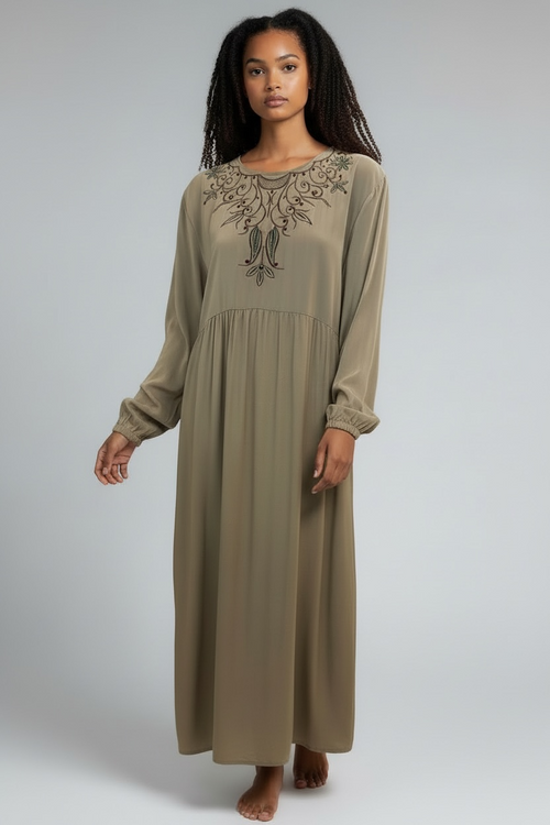 Seated view of olive taupe embroidered maxi dress
