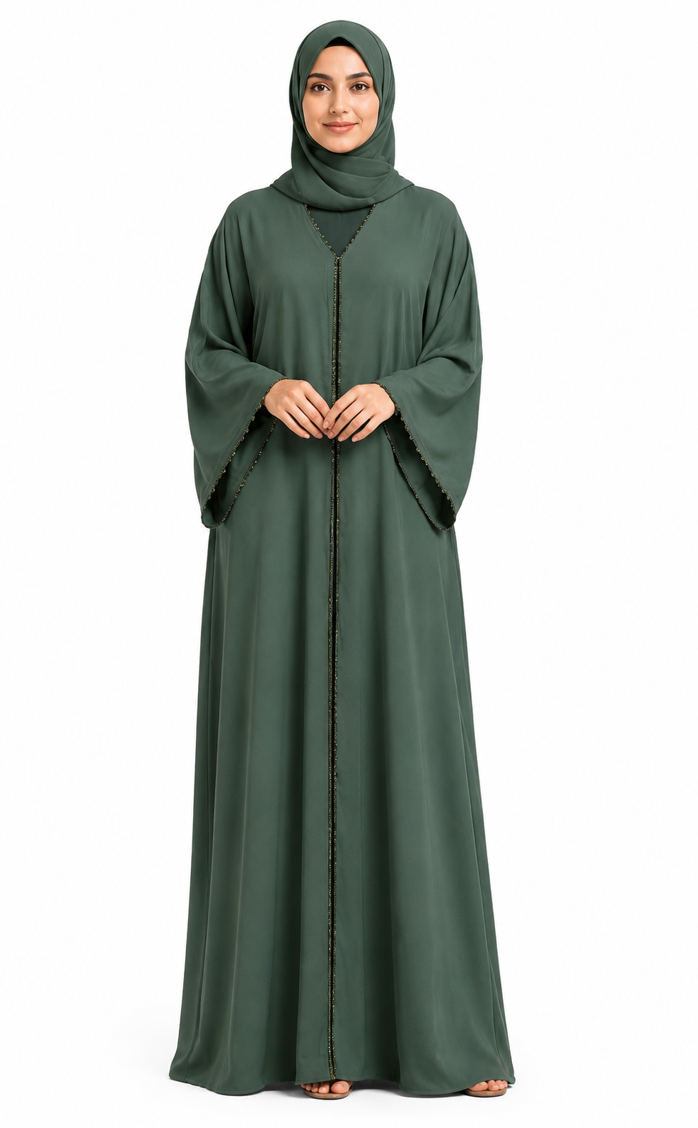 Model wearing the Amara Closed Abaya in Sage Green featuring elegant contrast trim and a timeless modest design by Simply Zida.