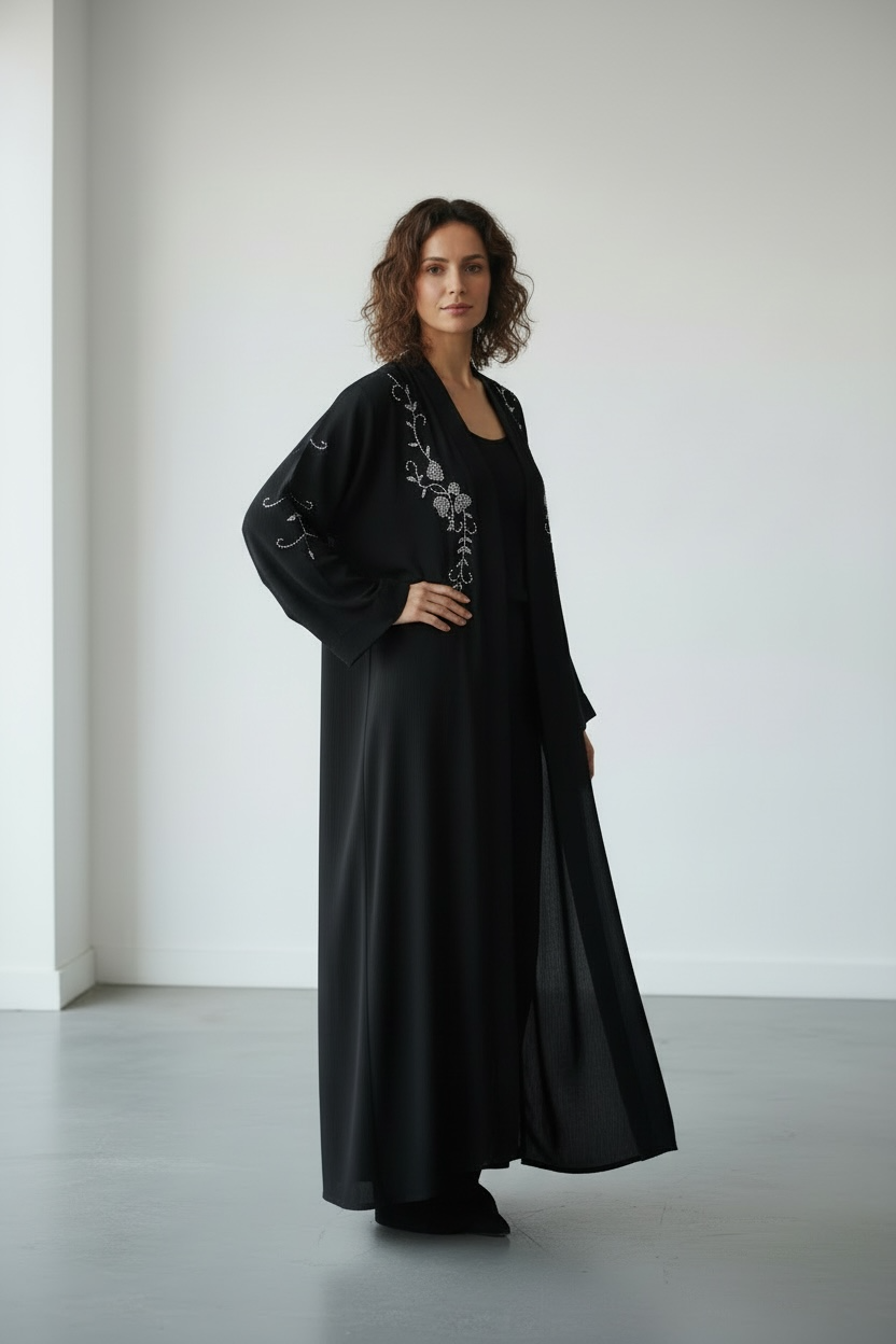 Elegant black abaya with delicate floral crystal stone detailing side view