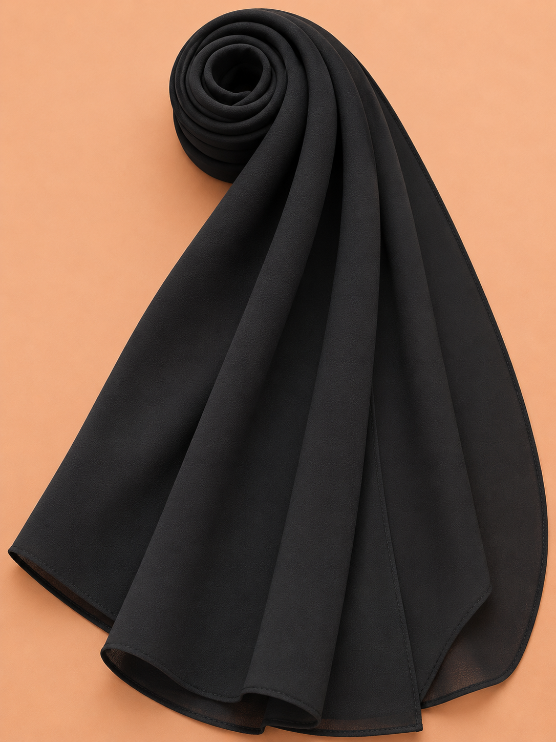 Classic black georgette hijab with elegant flowing drape on neutral background