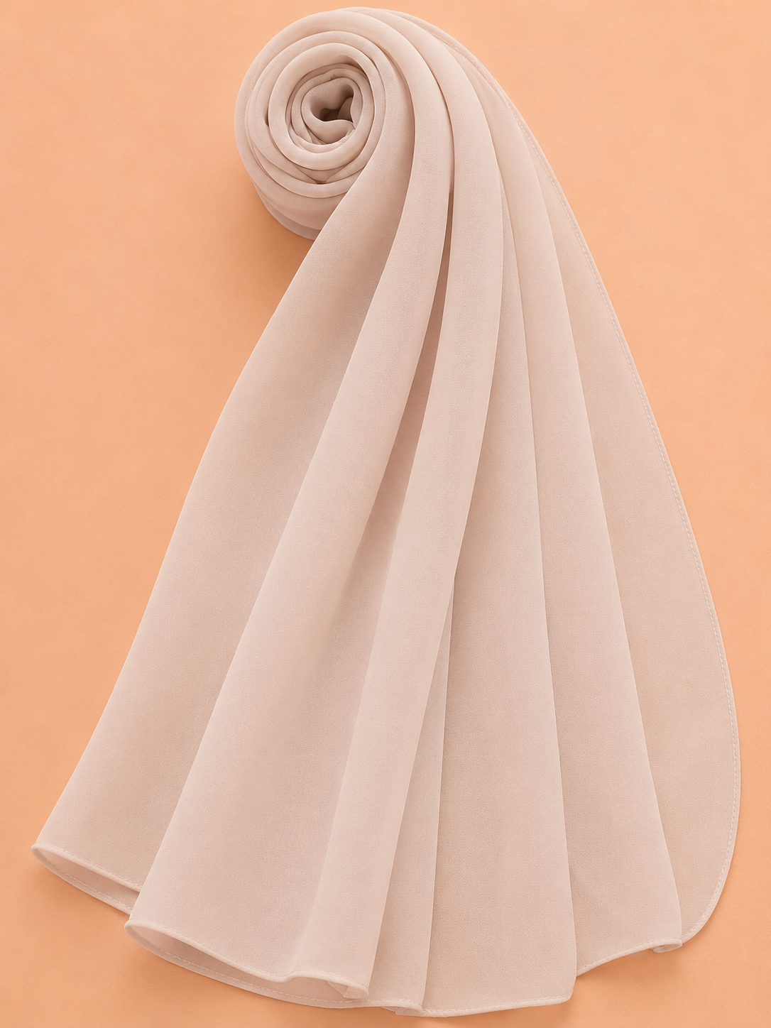 Light nude georgette hijab with elegant flowing drape on neutral background