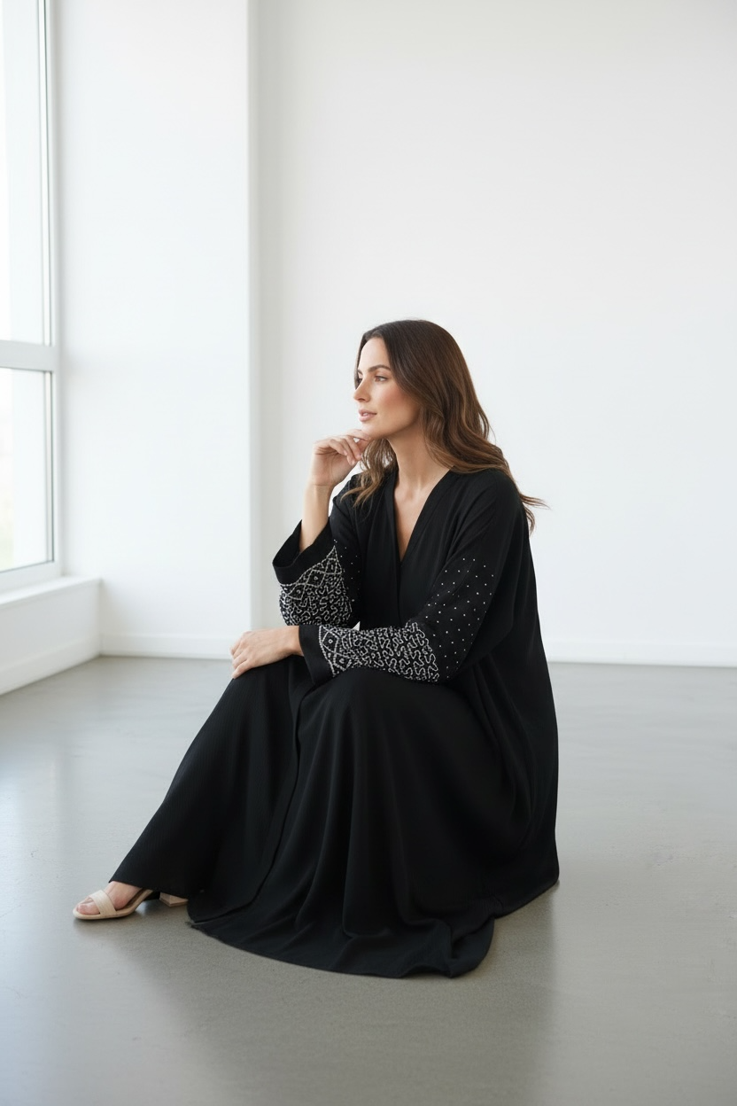 Side view luxury black abaya with stone and pearl sleeve embellishment