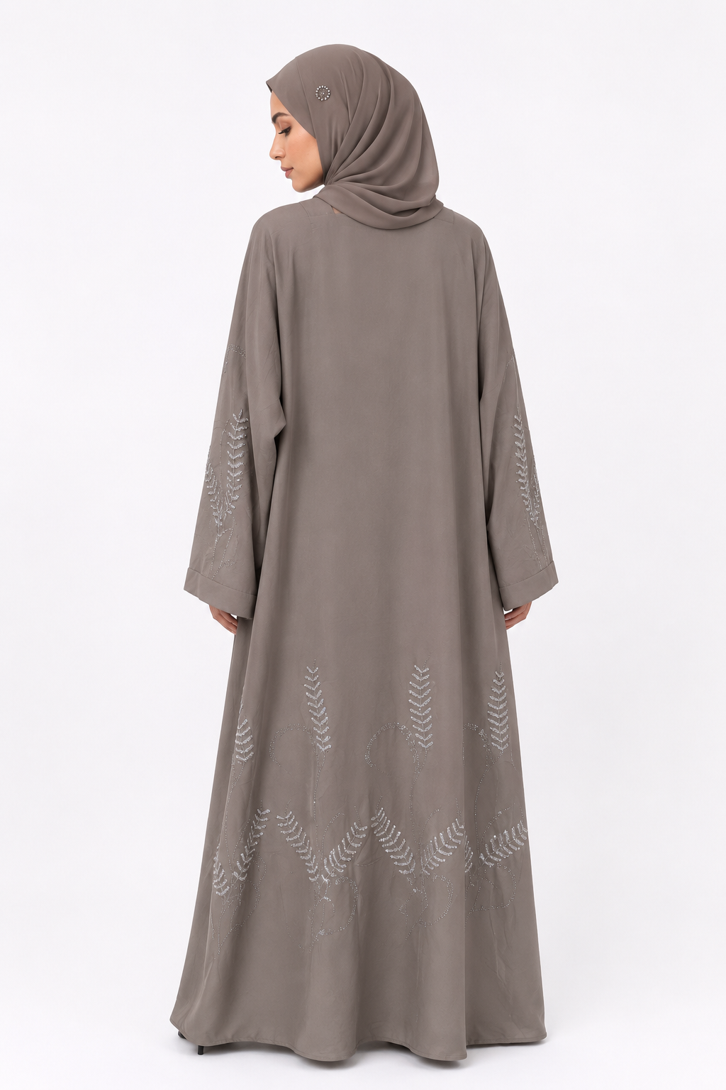 Back view of the Botanical Stone Closed Abaya in Stone Taupe showcasing stone detailing