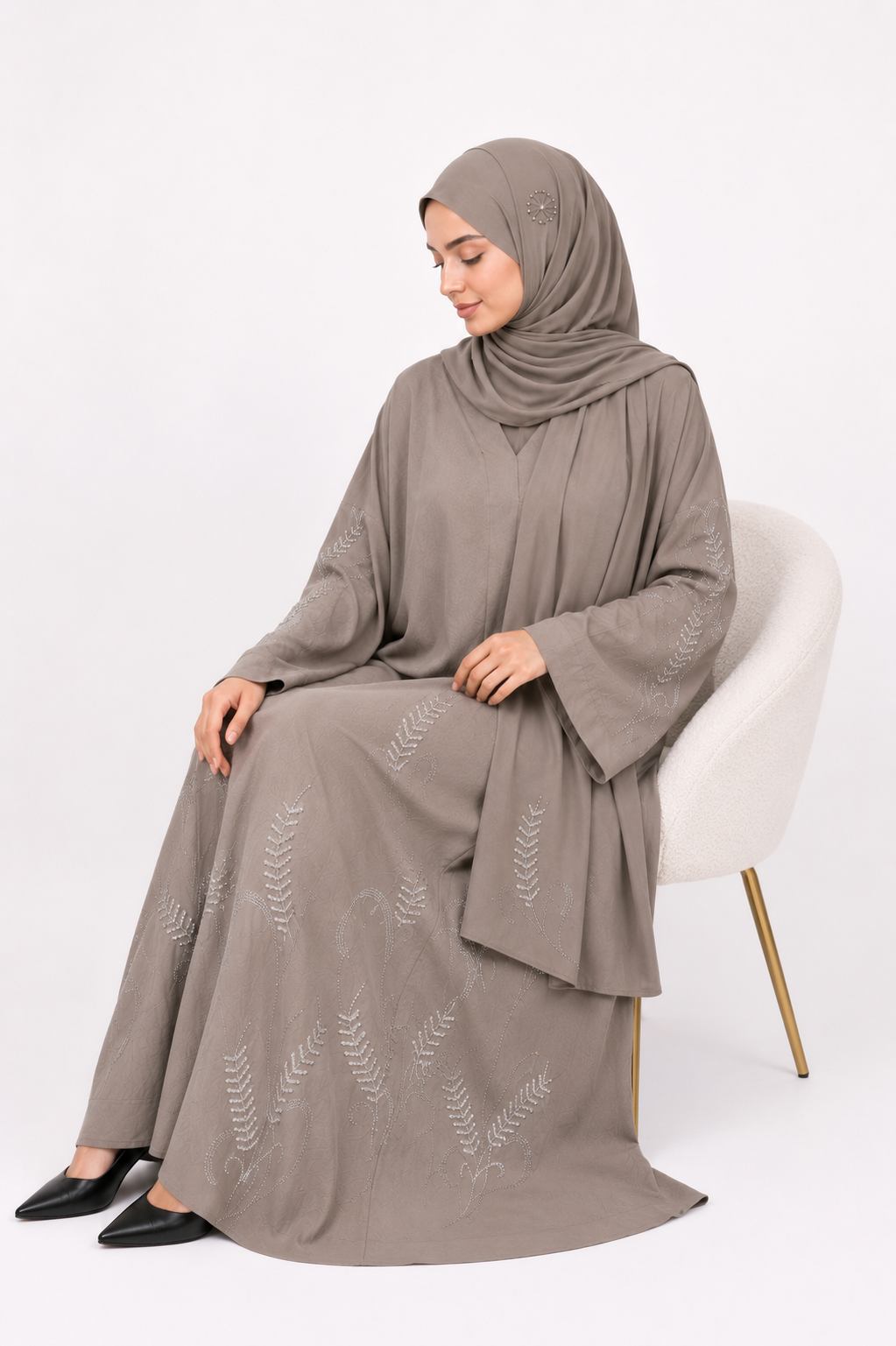 Front view of the Botanical Stone Closed Abaya in Stone Taupe by Simply Zida