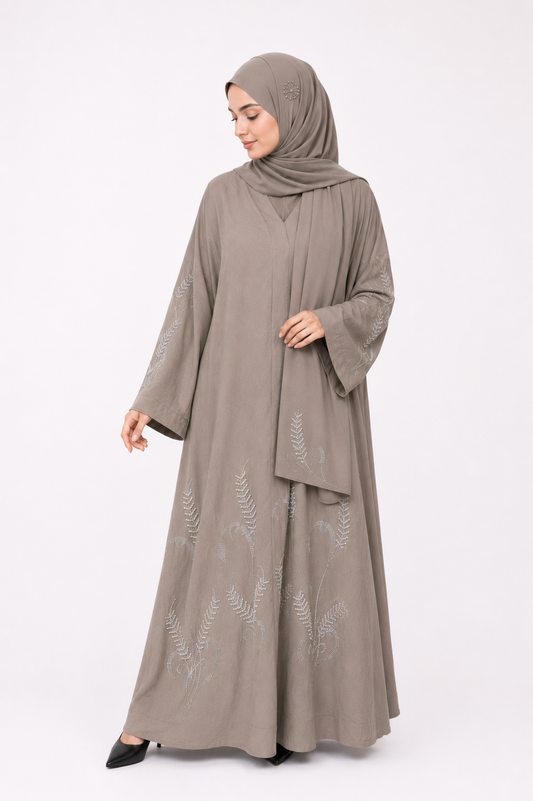 Botanical Stone Closed Abaya in Stone Taupe featuring elegant stone embellishments by Simply Zida