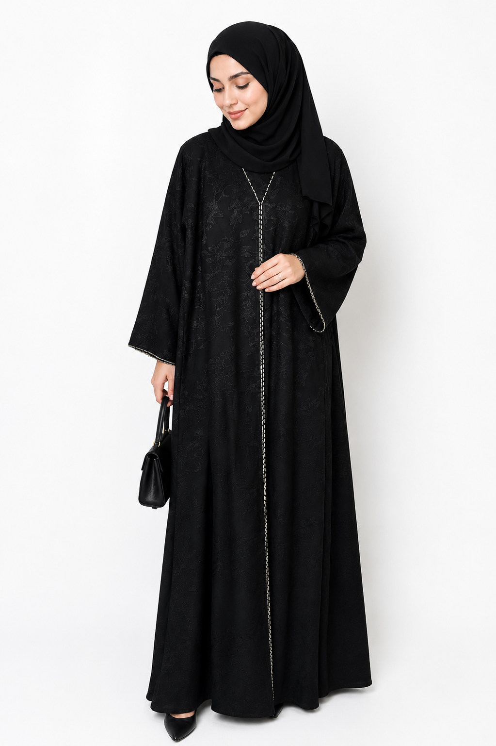 Front view of the Midnight Noir Embroidered Closed Abaya featuring elegant black floral detailing and embroidered trim by Simply Zida