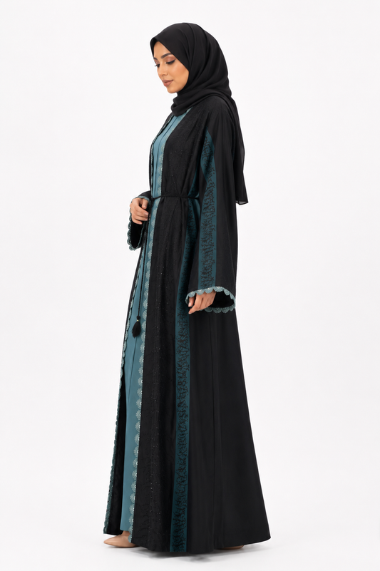 Side view of the Midnight Teal Embellished Open Abaya Set featuring a black open abaya, teal inner dress, lace trim and tassel belt by Simply Zida