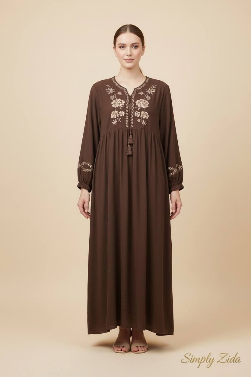 Front view of brown modest dress with floral embroidery
