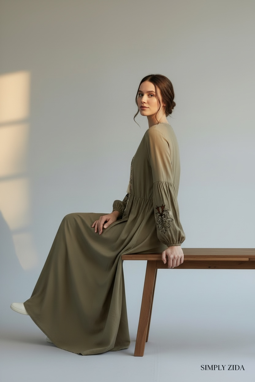 Side view of olive green long sleeve maxi dress
