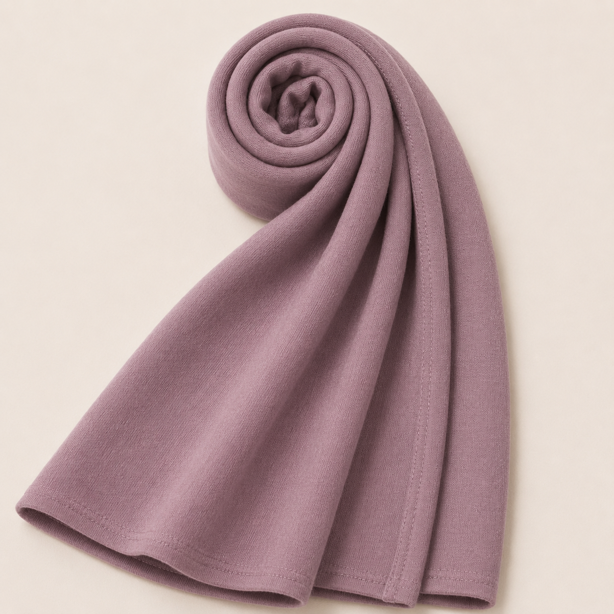 Premium dusty rose jersey hijab with soft stretch fabric and stitched edge detailing by Simply Zida