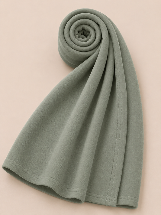 Premium dusty sage jersey hijab with soft stretch fabric and stitched edge detailing by Simply Zida