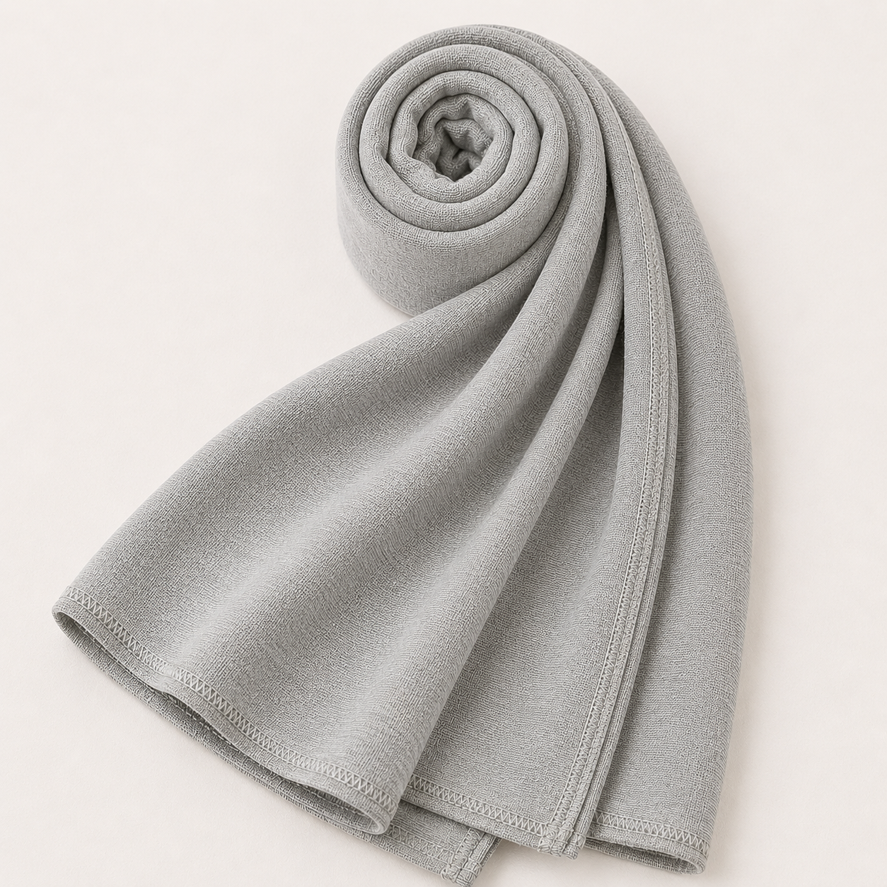 Premium light grey jersey hijab with soft stretch fabric and stitched edge detailing by Simply Zida