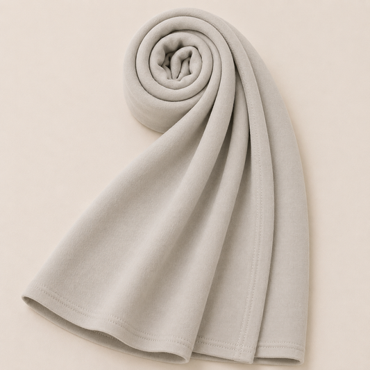 Premium oat beige jersey hijab with soft stretch fabric and stitched edge detailing by Simply Zida