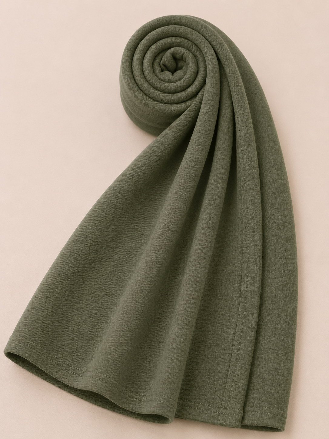 Premium olive green jersey hijab with soft stretch fabric and stitched edge detailing by Simply Zida