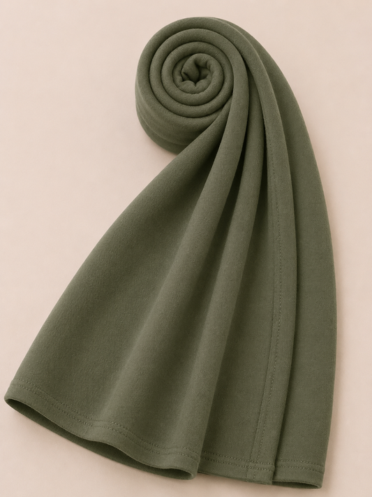Premium olive green jersey hijab with soft stretch fabric and stitched edge detailing by Simply Zida