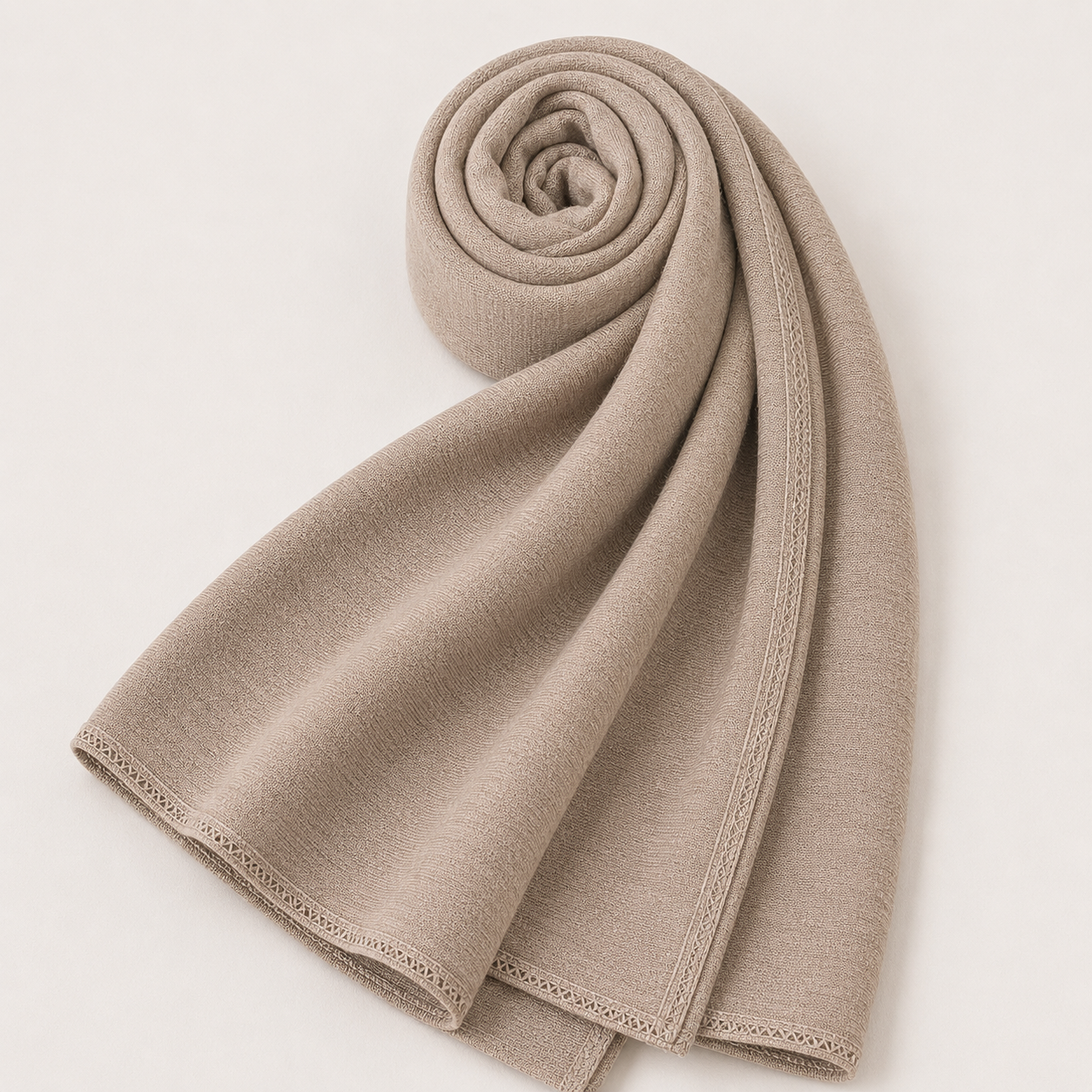 Premium taupe beige jersey hijab with soft stretch fabric and stitched edge detailing by Simply Zida