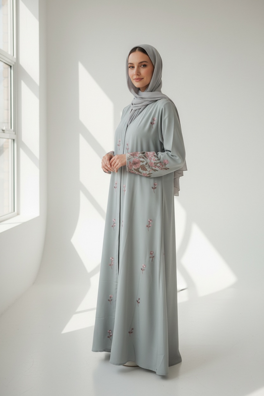 Front view of Sage Blossom Embroidered Abaya by Simply Zida with floral sleeve embroidery