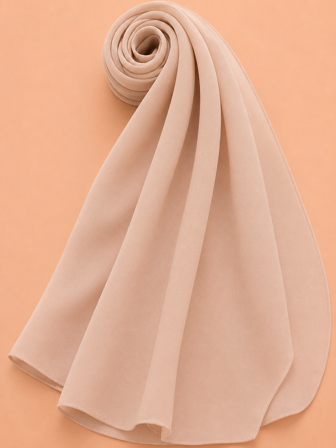 Soft nude georgette hijab with elegant flowing drape on neutral background